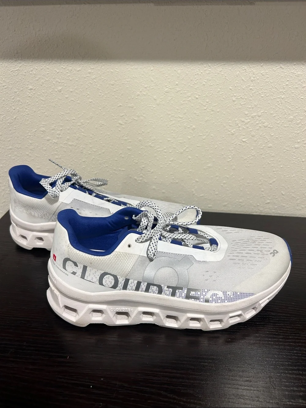 On Running White and Blue Cloudmonster Sneakers